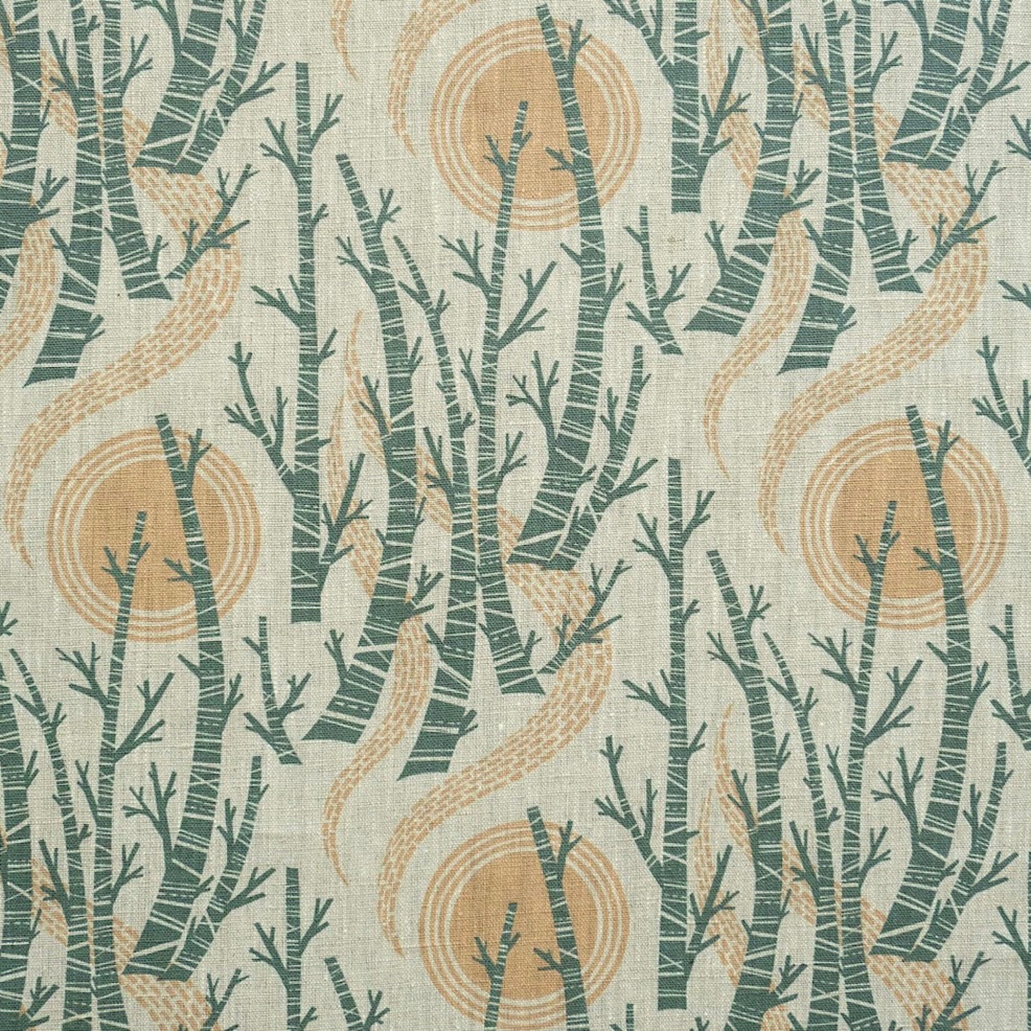 printed fabric with sun and tree motif on natural linen