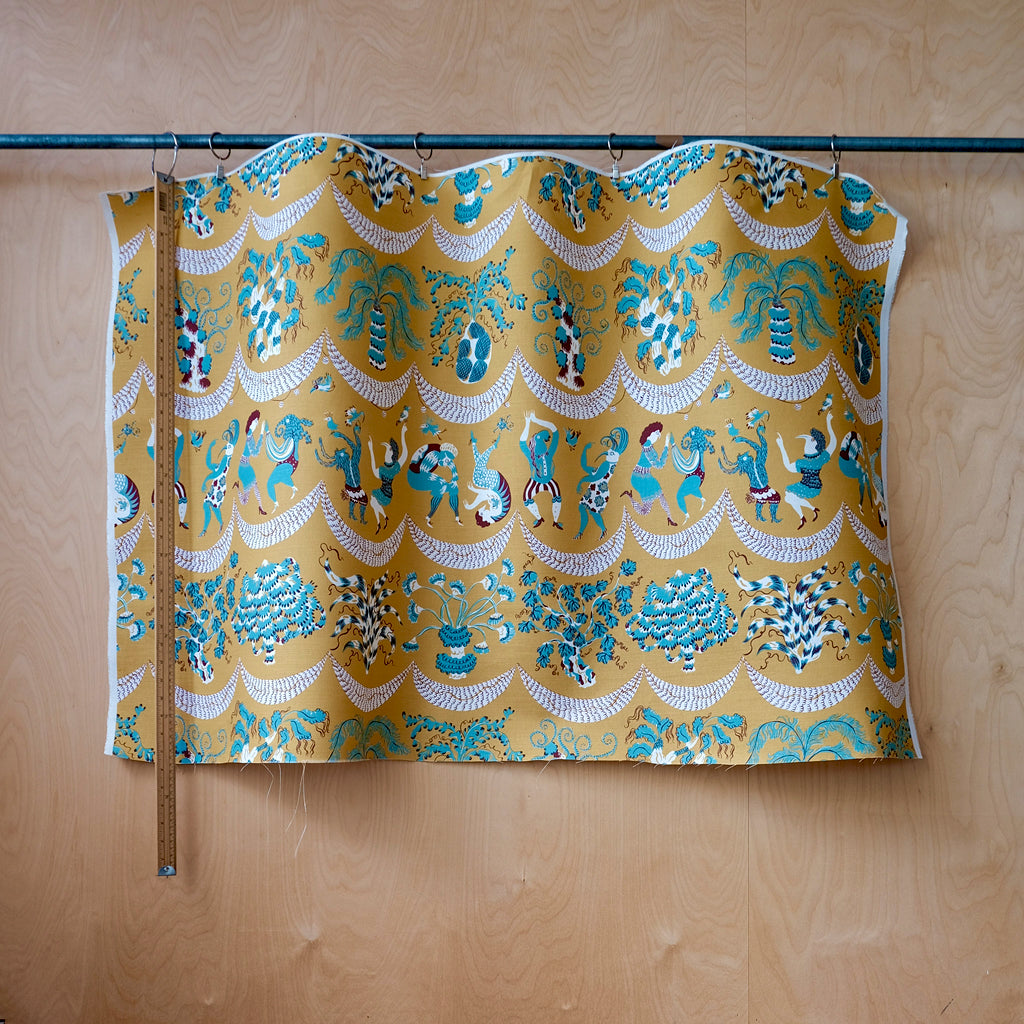 Pattern fabric with foliage motifs in ochre and blue colours.