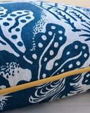 Cushion with blue screen printed design with ochre trim.