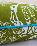 Green and white fabric with turquoise a wooden surface