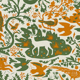 Patterned fabric with animal and plant designs in green and orange colours on ecru linen