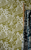 green white wallpaper with wooden ladder and dark blue fabric